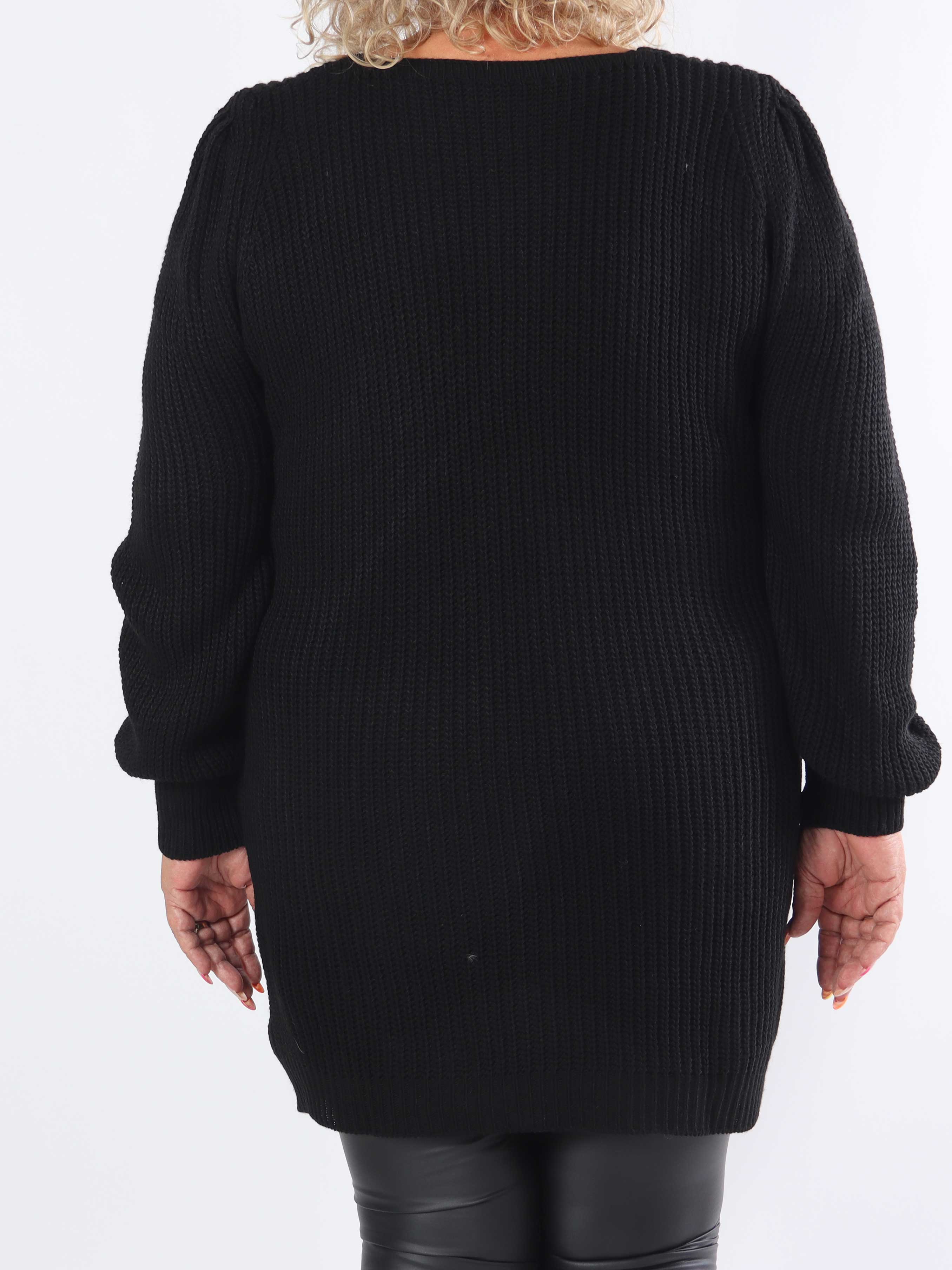 Dajana - Stickad klänning i plus size med ballongärmar